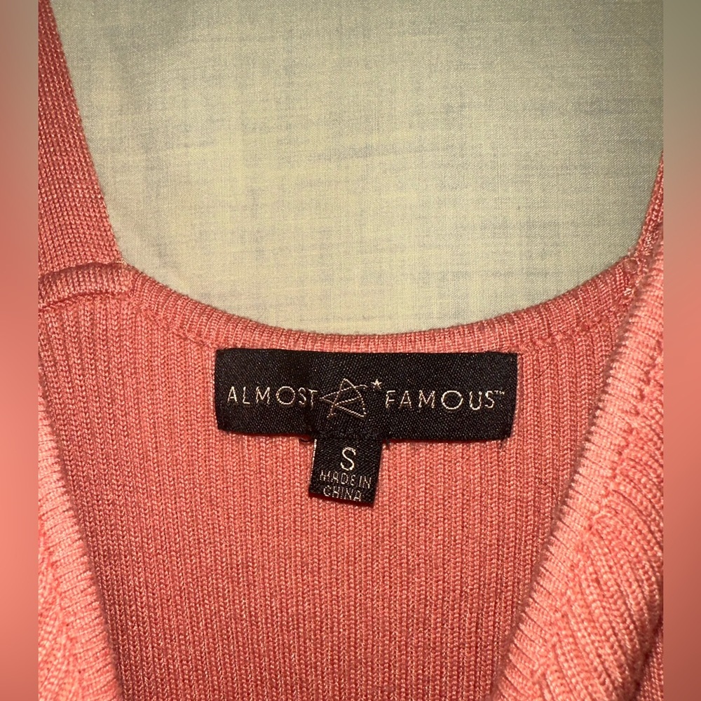 Peach rib knitted mid length dress.